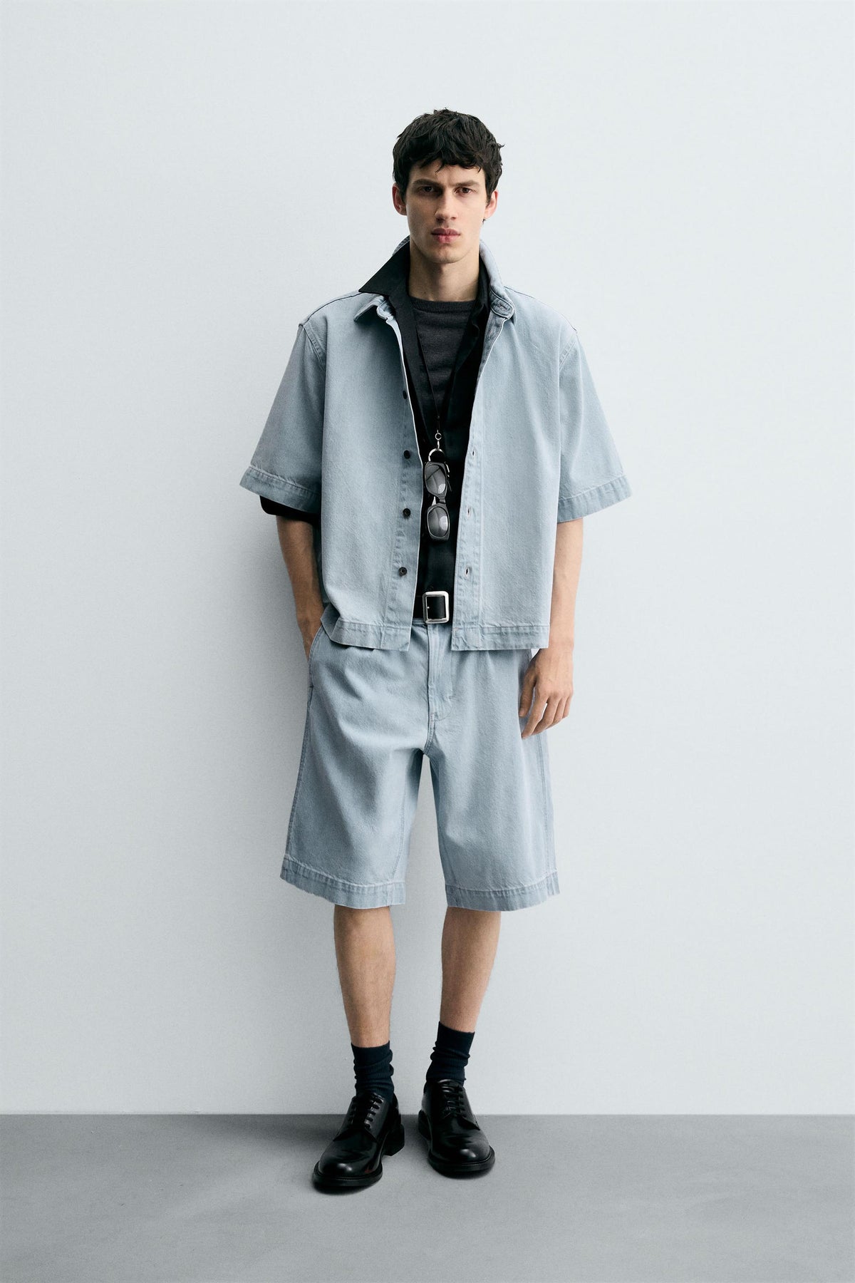 PLEATED RELAXED FIT DENIM BERMUDA SHORTS - Image 1