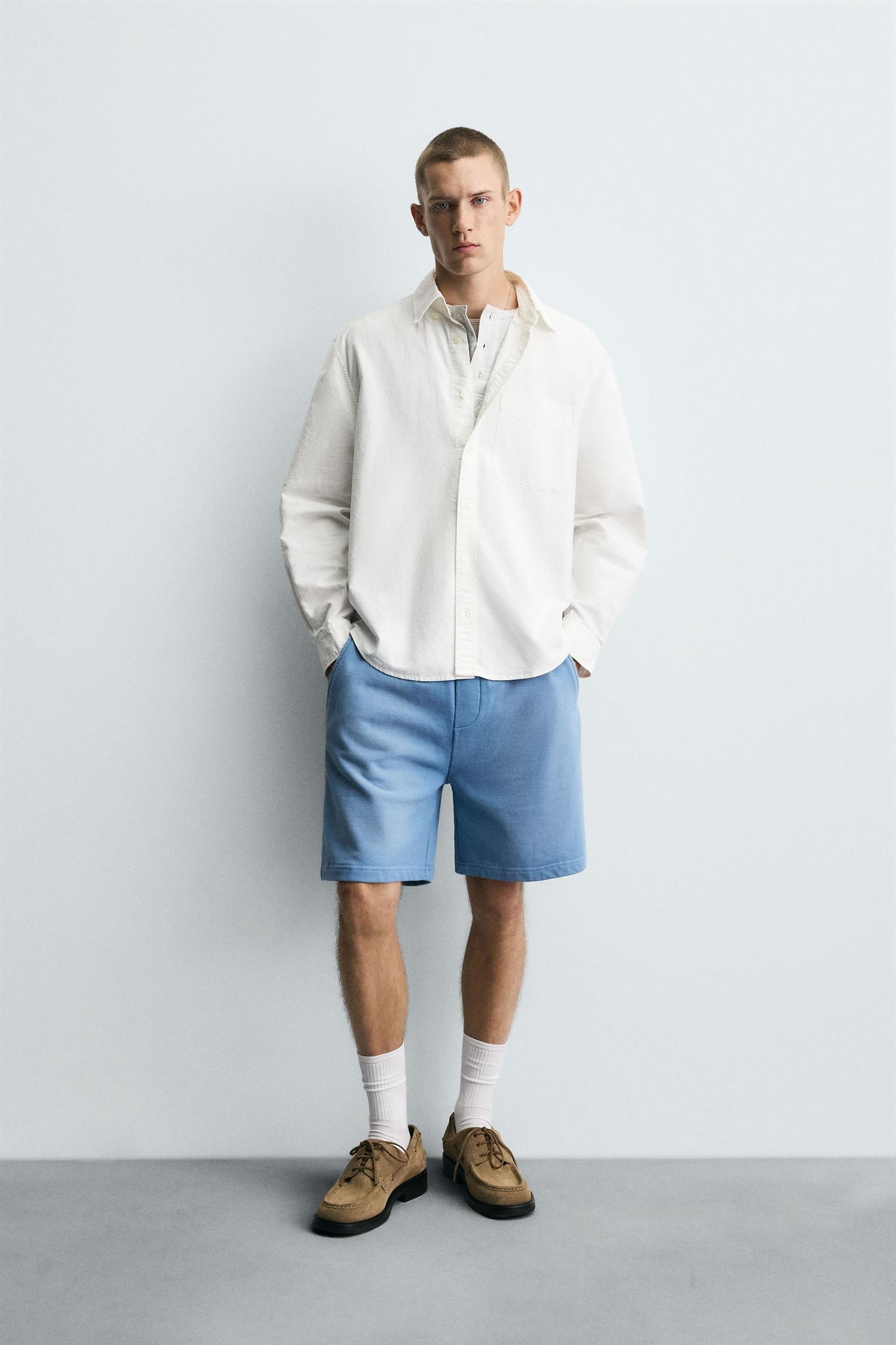 SPRAY WASHED BERMUDA SHORTS - Image 1