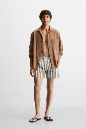 STRIPED MID-LENGTH SWIMMING TRUNKS - Image 1