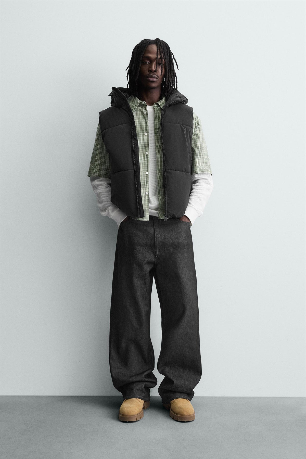 RUBBERISED PUFFER GILET - Image 1