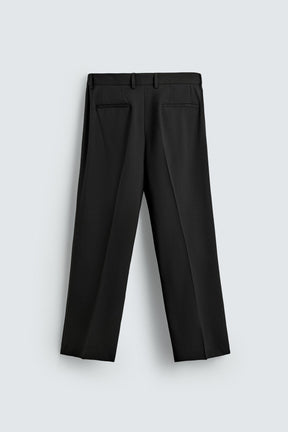 LOOSE-FITTING FLARED TROUSERS - Image 9