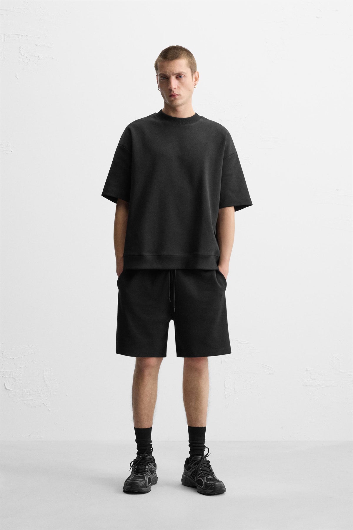 TECHNICAL INTERLOCK BERMUDA SHORTS - Image 1
