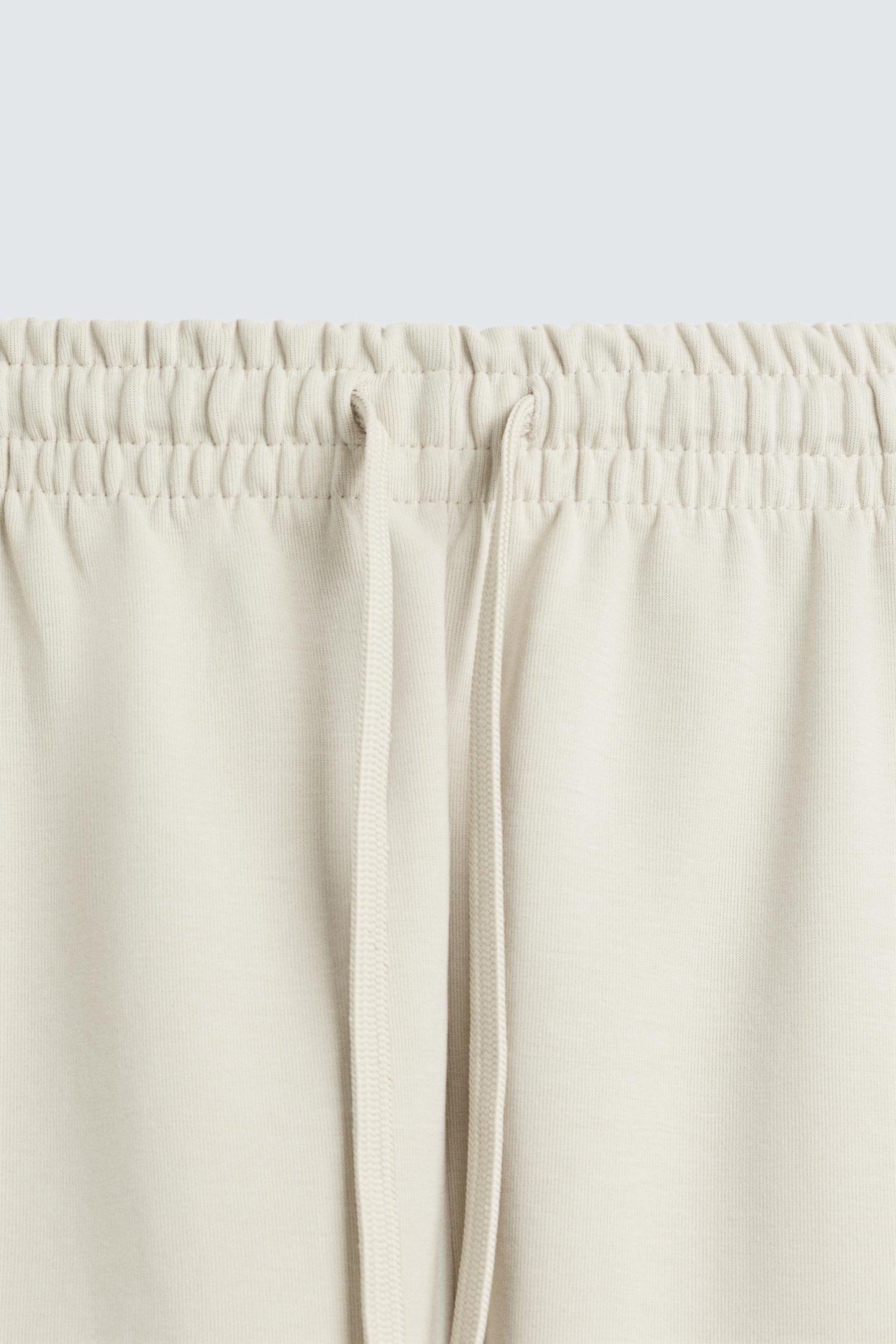 TECHNICAL INTERLOCK BERMUDA SHORTS - Image 8