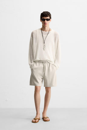 TECHNICAL INTERLOCK BERMUDA SHORTS - Image 1