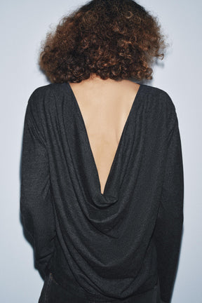 Drapiertes, nach hinten gekämmtes Stoffverdeck