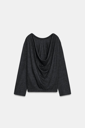 Drapiertes, nach hinten gekämmtes Stoffverdeck