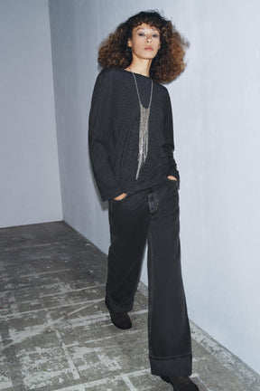 Drapiertes, nach hinten gekämmtes Stoffverdeck