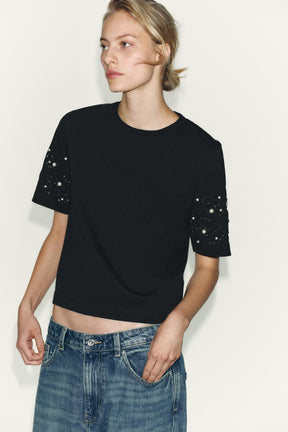 Besticktes Perlenhemd