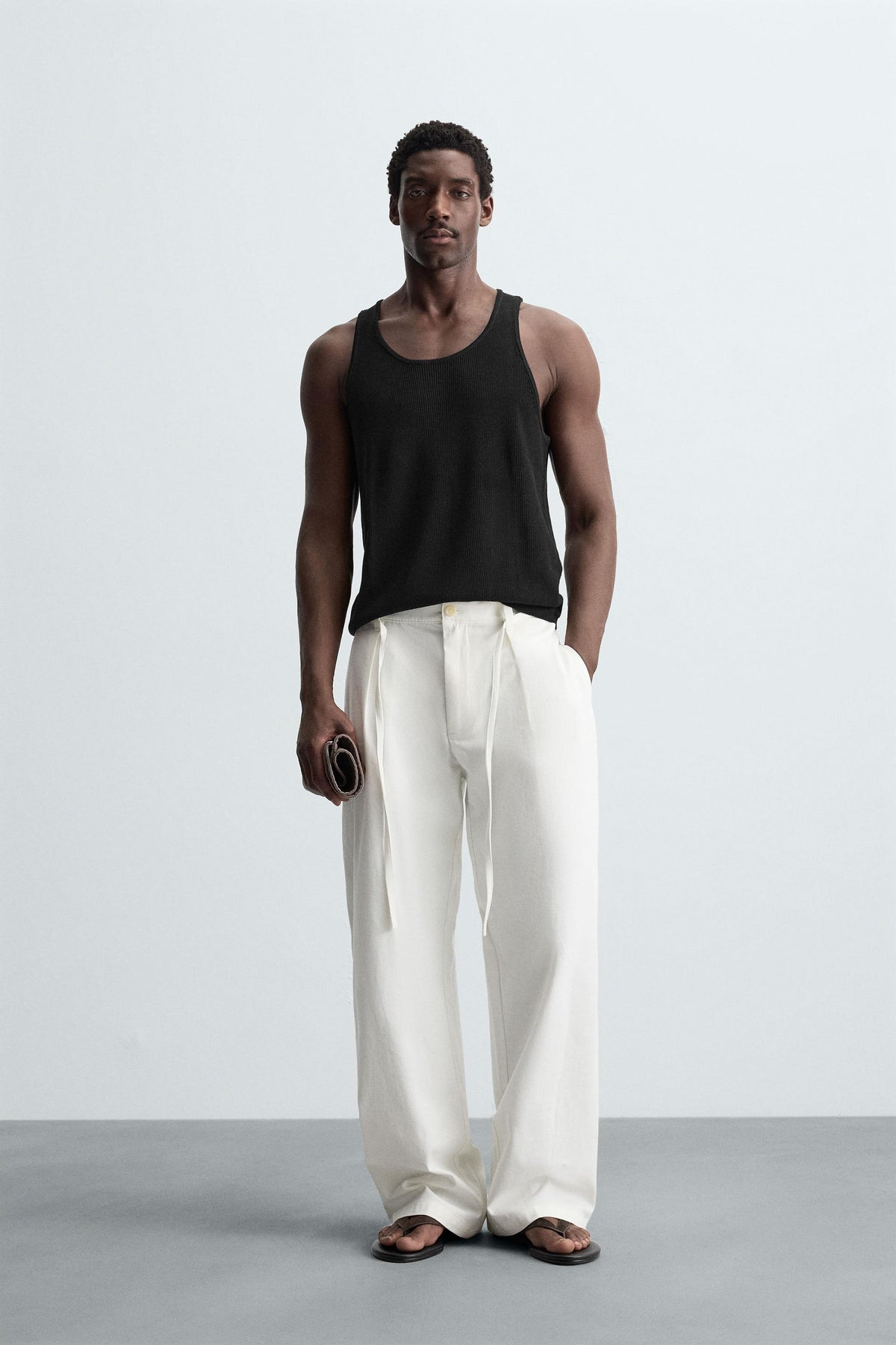 RELAXED FIT PLEATED TROUSERS - Image 1