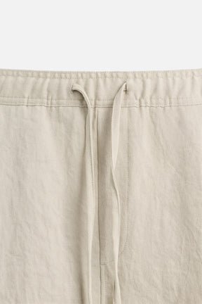 PLEATED FLOWING BERMUDA SHORTS - Image 9