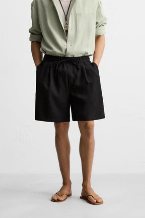 PLEATED FLOWING BERMUDA SHORTS - Image 2
