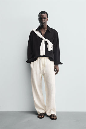 LINEN RELAXED FIT TROUSERS - Image 1
