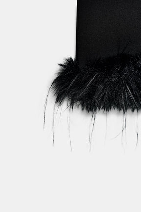 Saum mit Kunstpelzbesatz