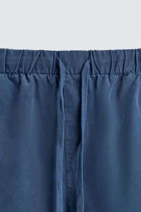 LYOCELL-COTTON RELAXED FIT BERMUDA SHORTS - Image 9