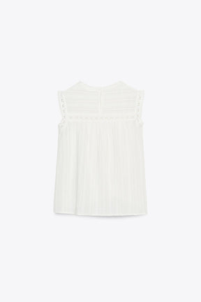 Ärmelloses, romantisches Modetop.