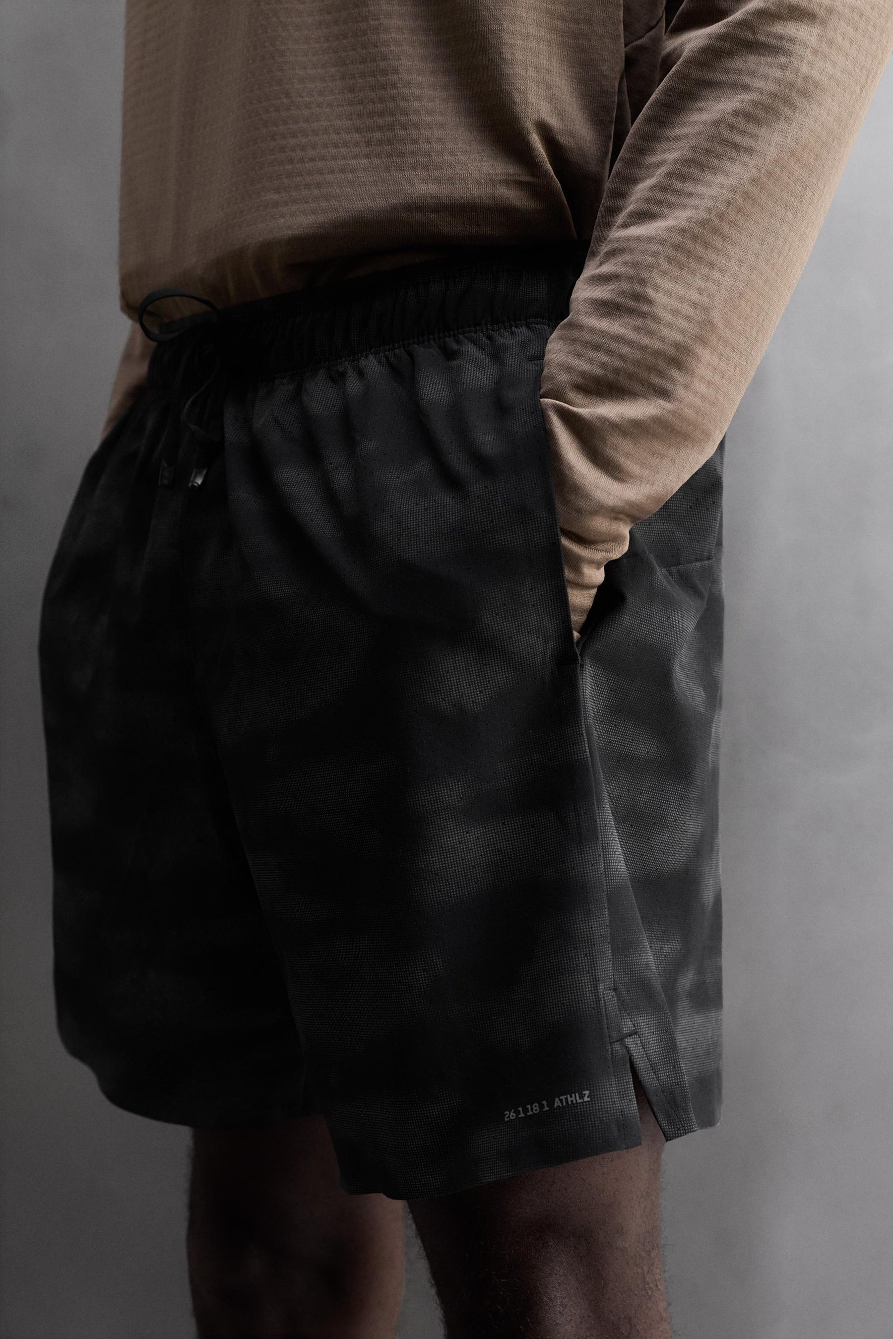 PERFORATED RUNNING SHORTS - Image 6