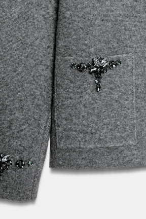 Perlenbesetzte Strickjacke