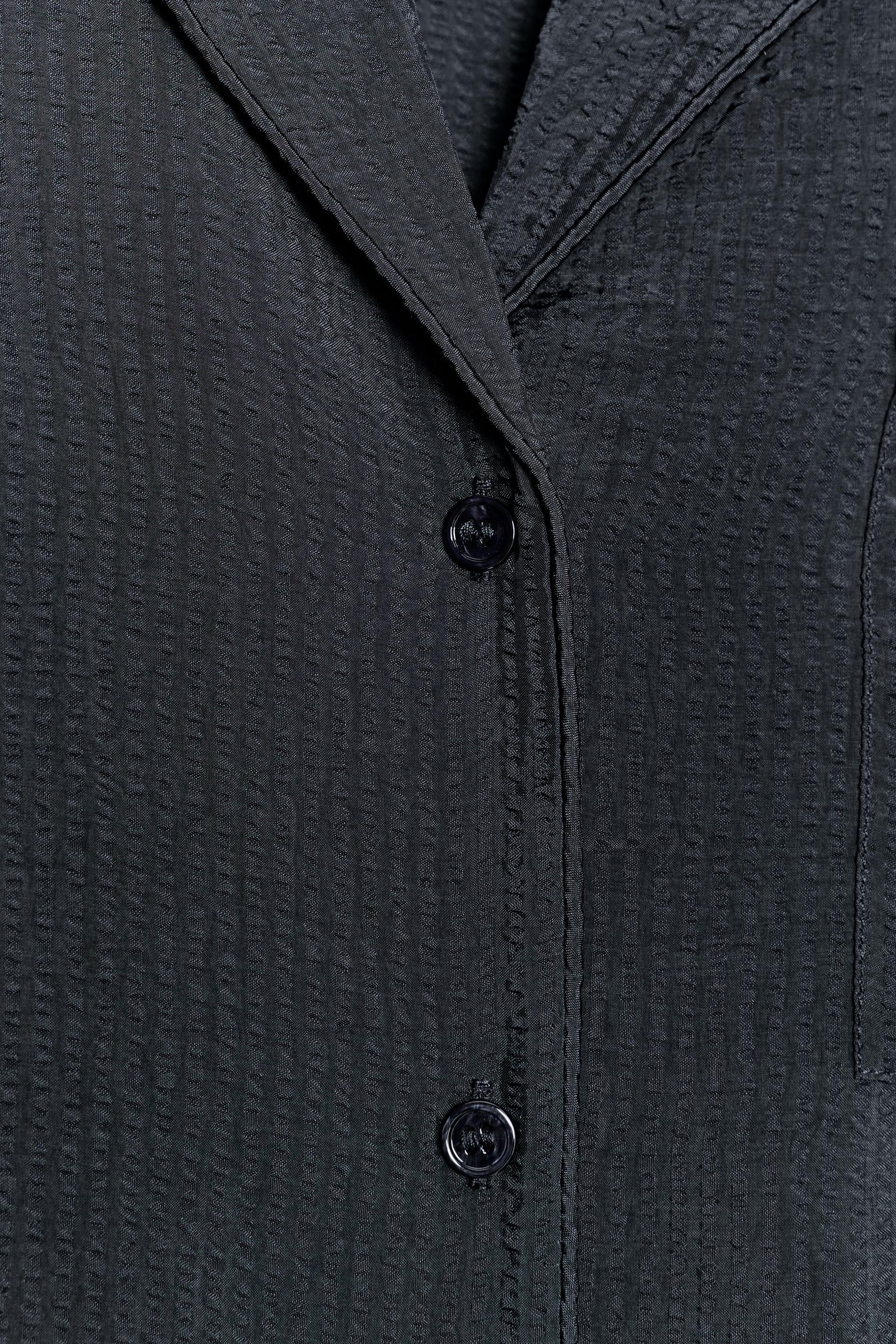 Fließendes Hemd mit Tasche