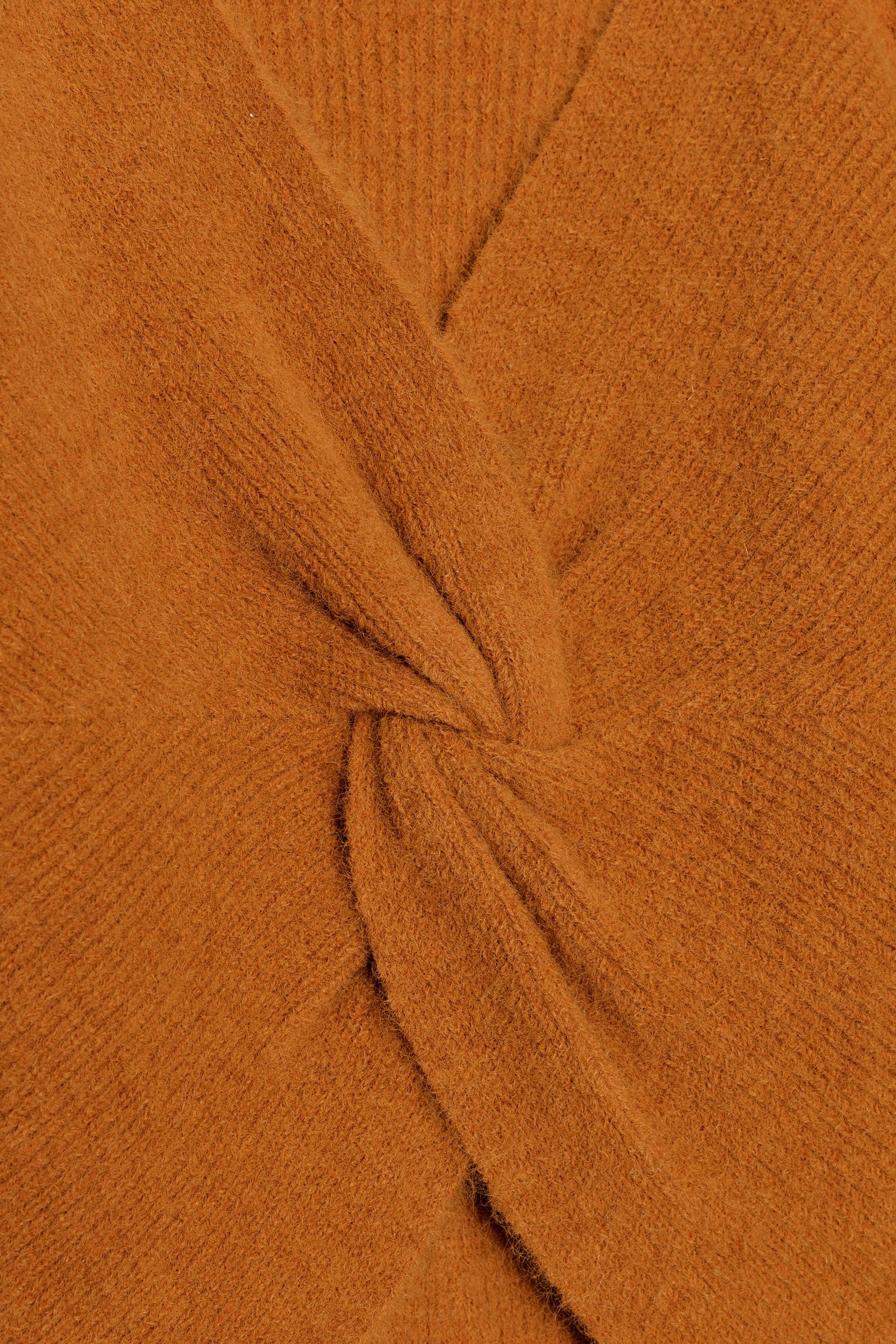 Strickpullover mit Knoten im Rücken