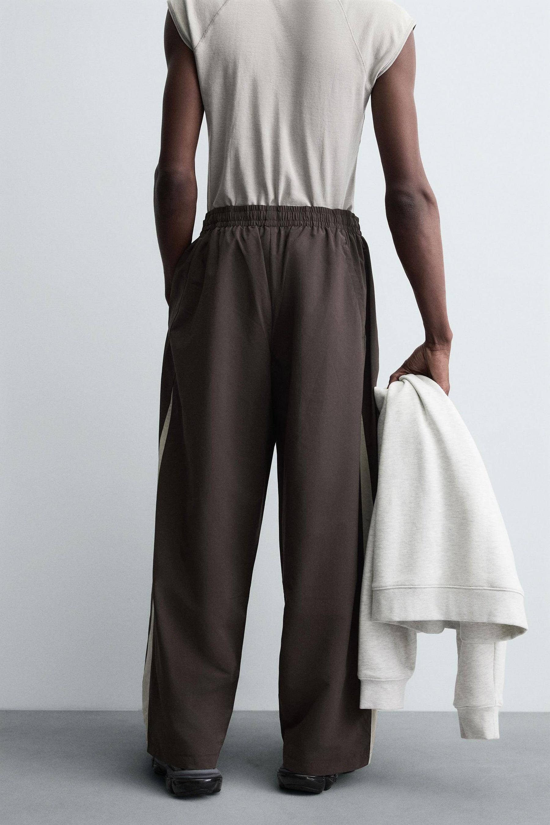 TECHNICAL TROUSERS WITH TAPING - Image 3