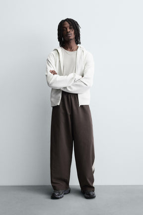 TECHNICAL TROUSERS WITH TAPING - Image 1
