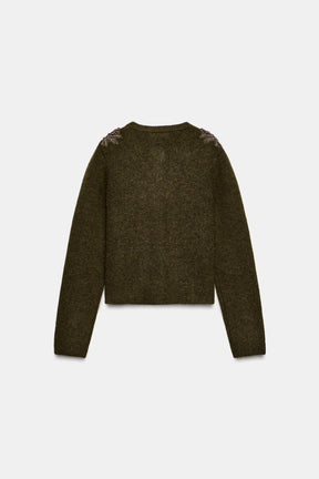 Perlenbesetzte Strickjacke