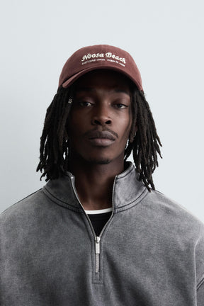 CAP WITH EMBROIDERED TEXT - Image 1