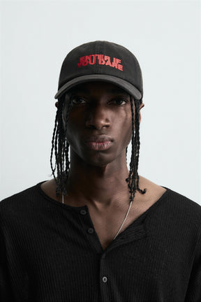 WASHED CAP WITH PRINTED TEXT - Image 1