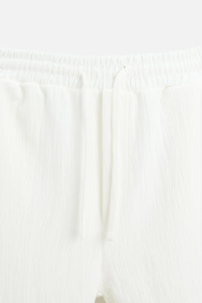 TEXTURED JOGGER BERMUDA SHORTS - Image 6