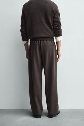 RELAXED FIT PLEATED TROUSERS - Image 3