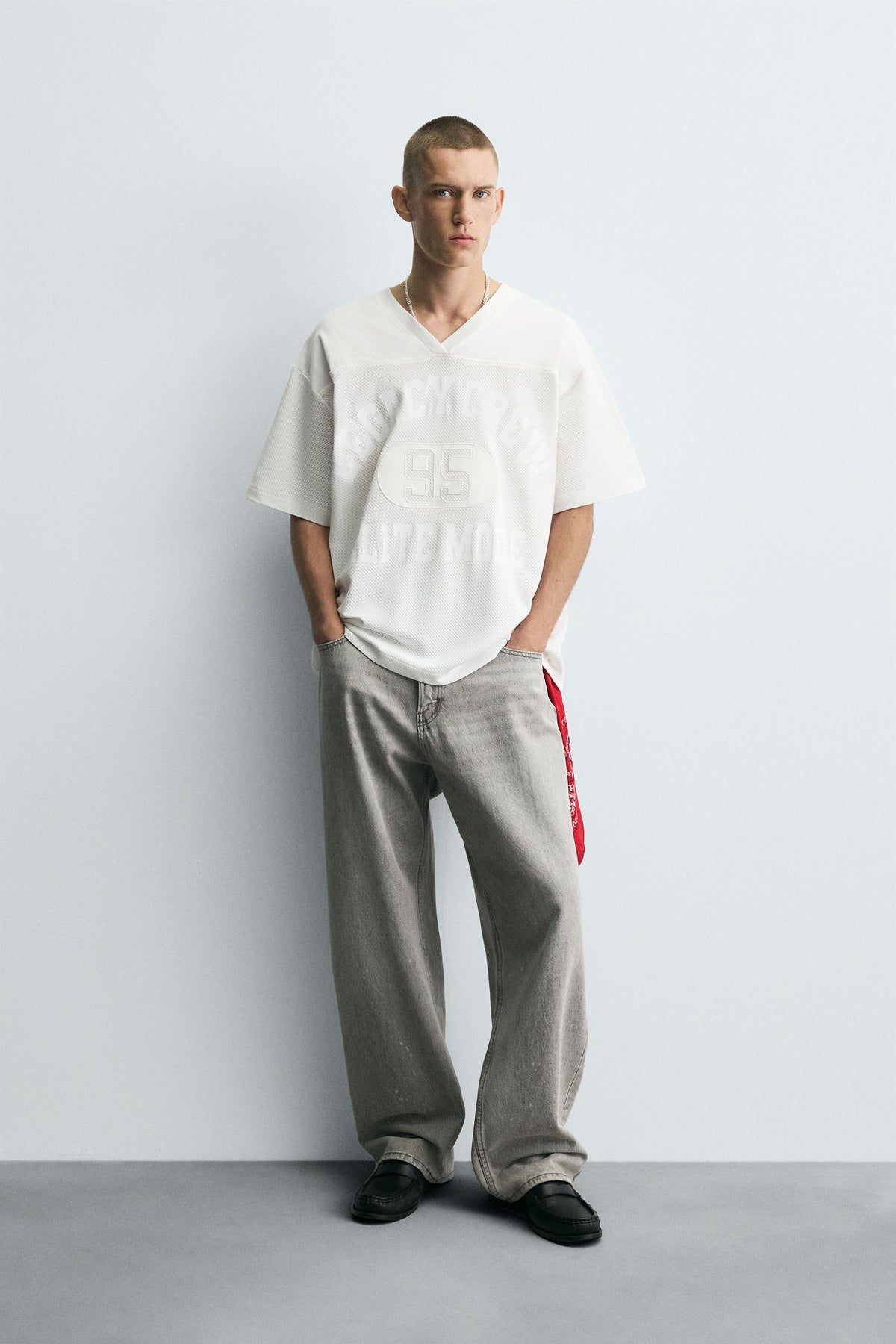 T-SHIRT WITH CONTRAST SLOGANS - Image 1