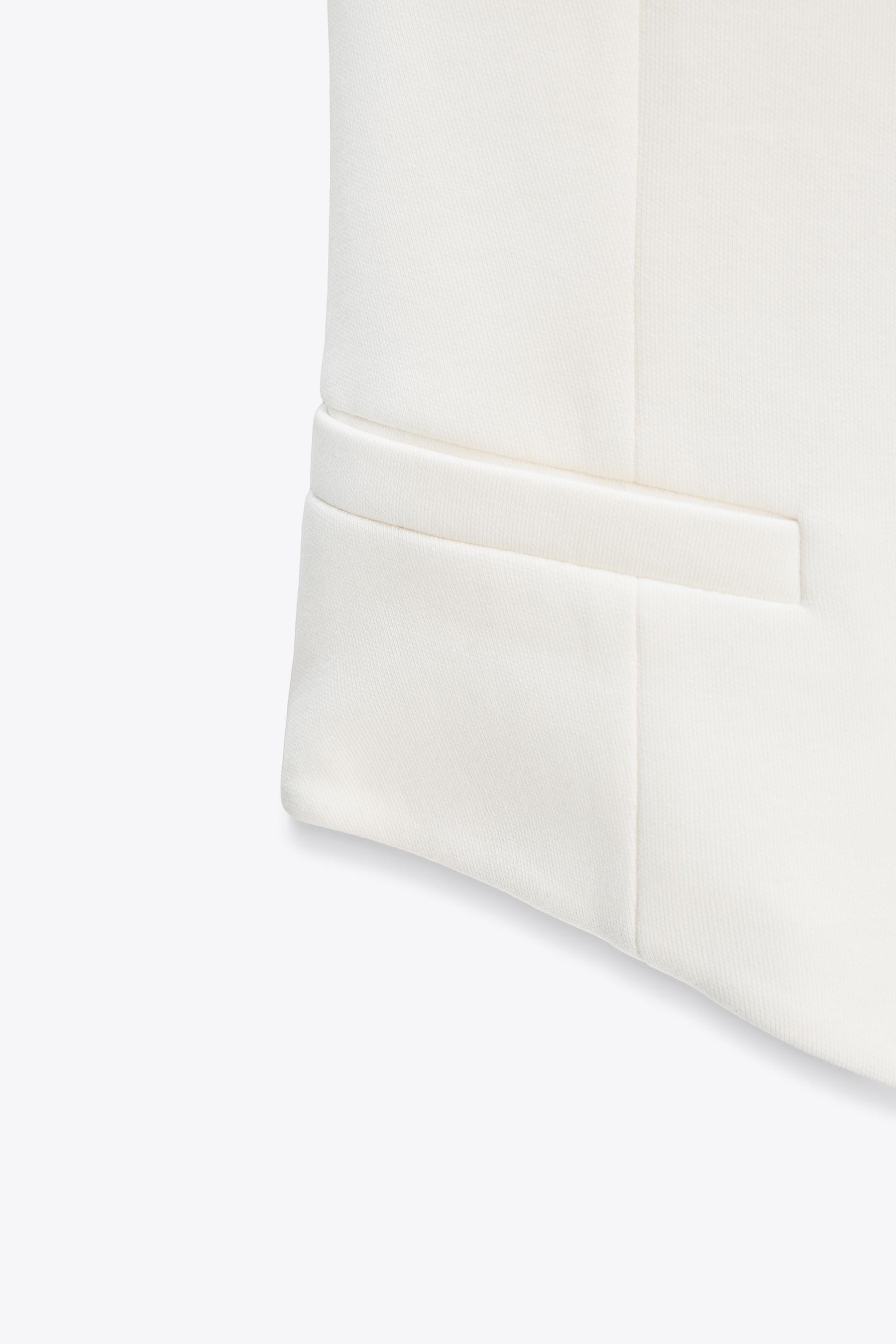 Asymmetrische Interlock-Weste