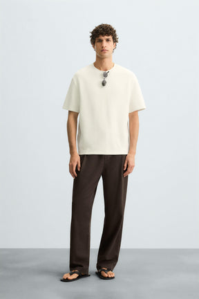 PLEATED FLOWING TROUSERS - Image 1