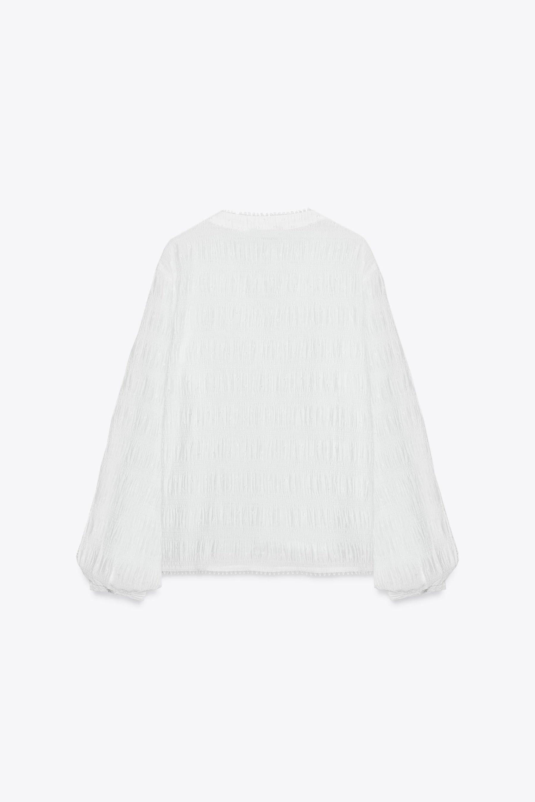 Bluse mit Spitzenbesatz