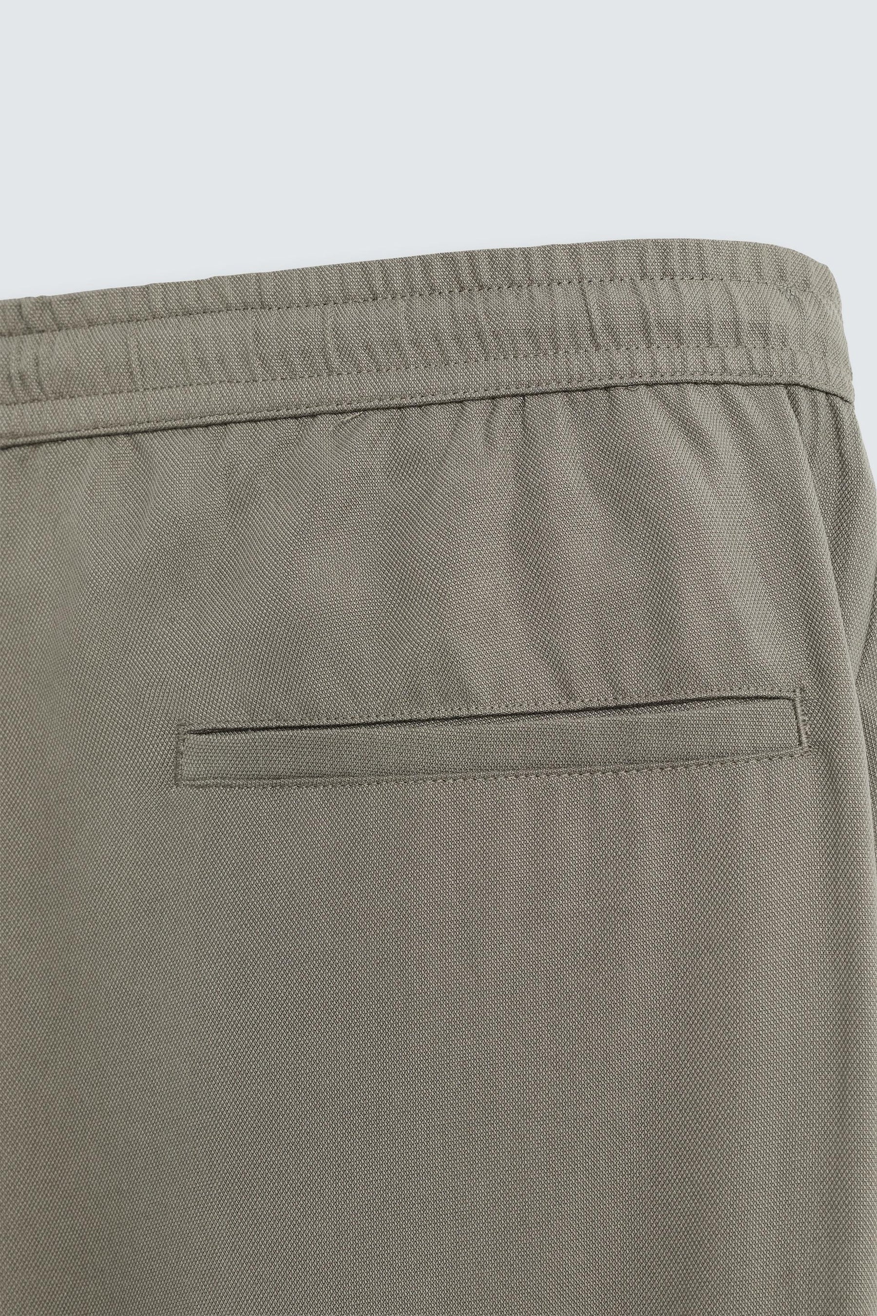 RELAXED FIT FLOWING TROUSERS - Image 9