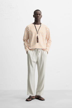 RELAXED FIT FLOWING TROUSERS - Image 1