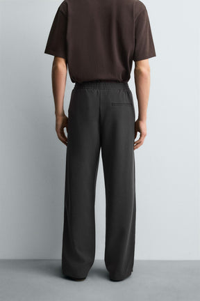 FLOWING TROUSERS WITH ZIPS - Image 3