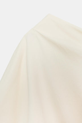 Asymmetrisch drapierte Modebluse