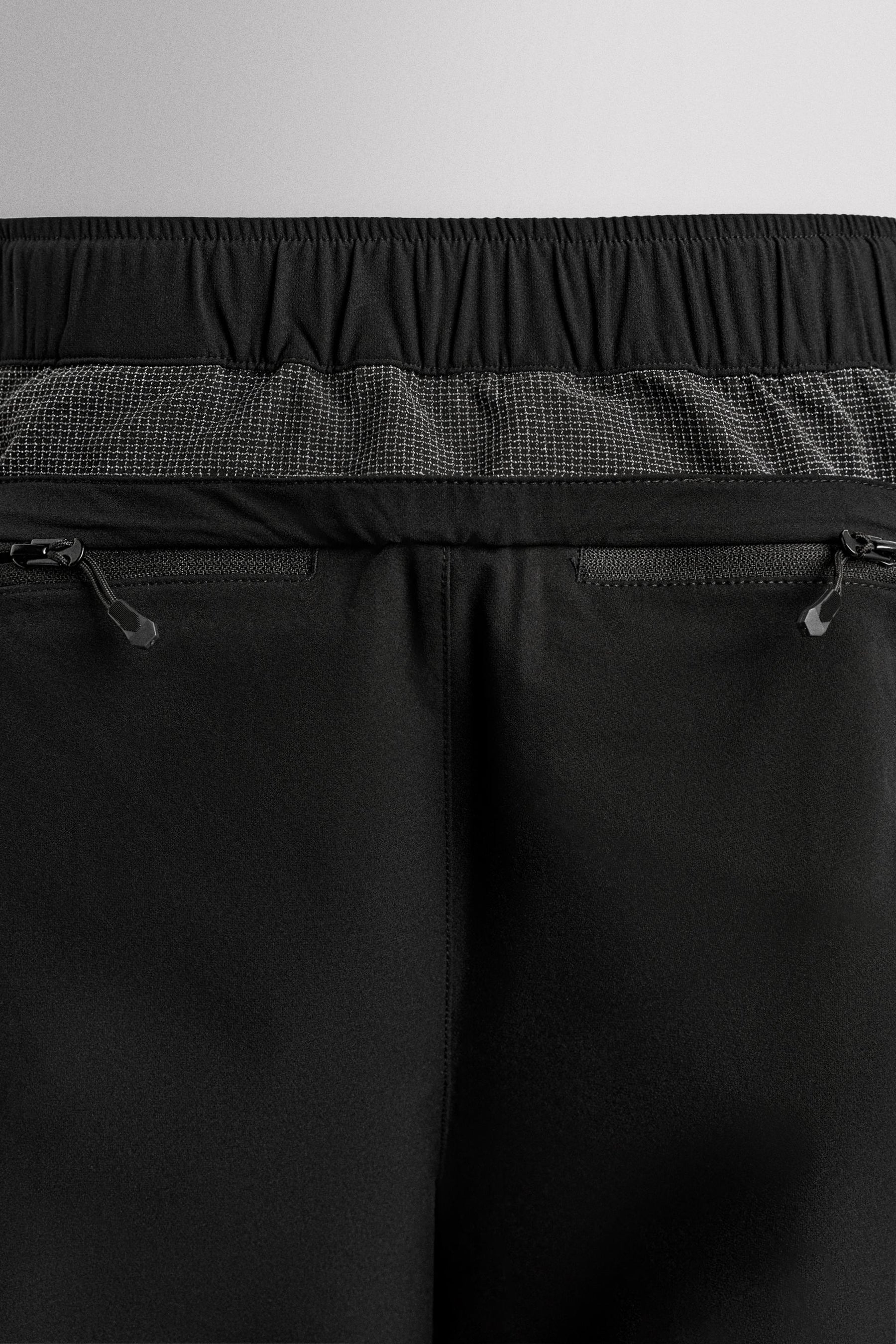 TECHNICAL TROUSERS WITH BELT - Image 6