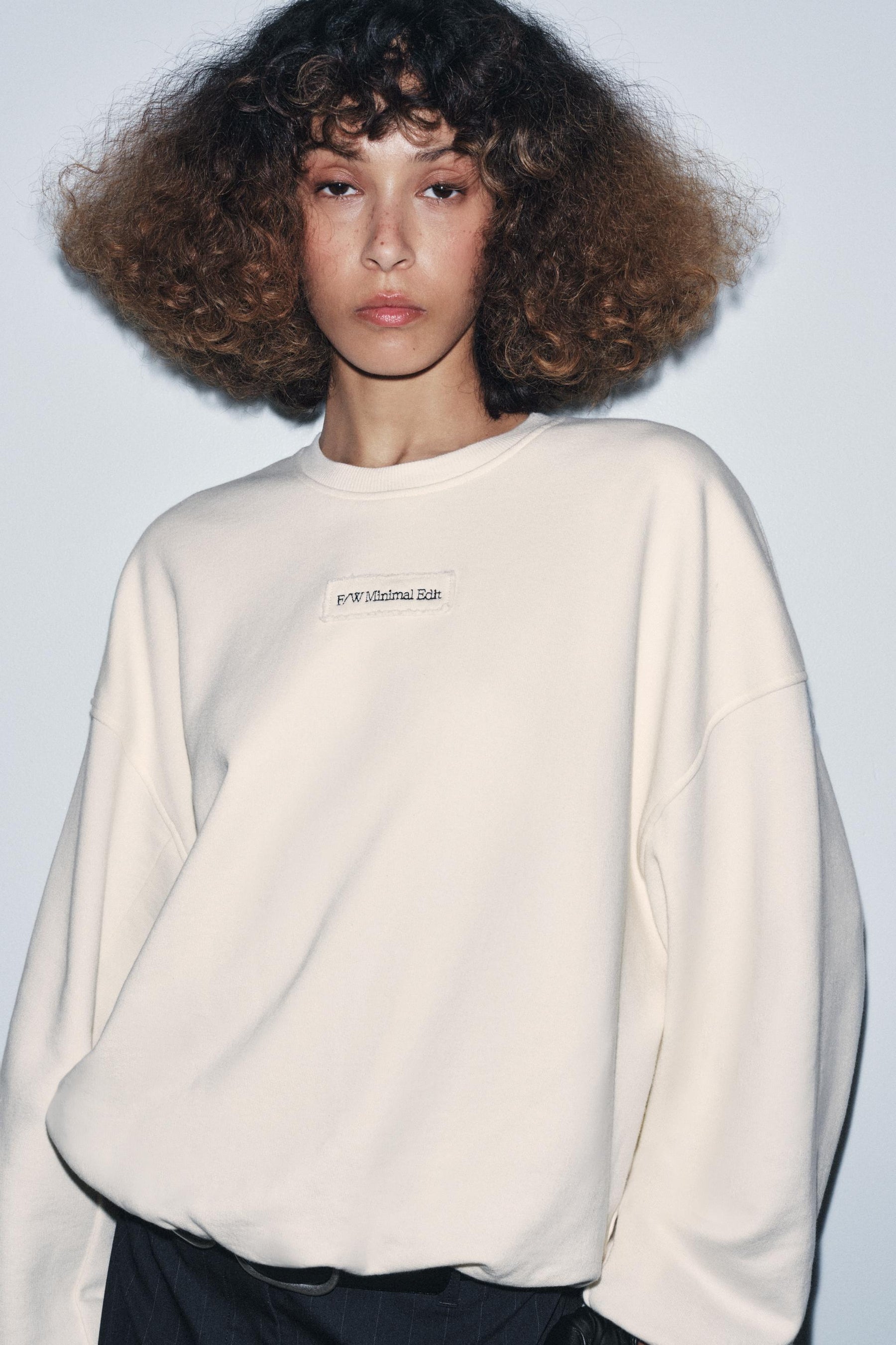 Sweatshirt mit besticktem Slogan