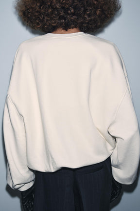 Sweatshirt mit besticktem Slogan