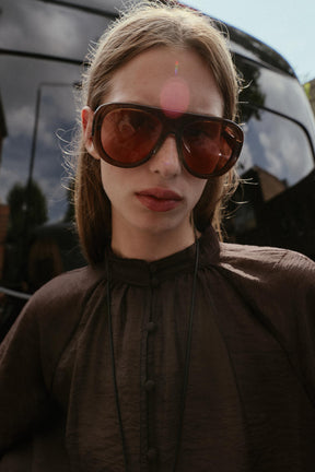 Transparente Bluse mit Puffärmeln