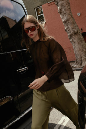 Transparente Bluse mit Puffärmeln