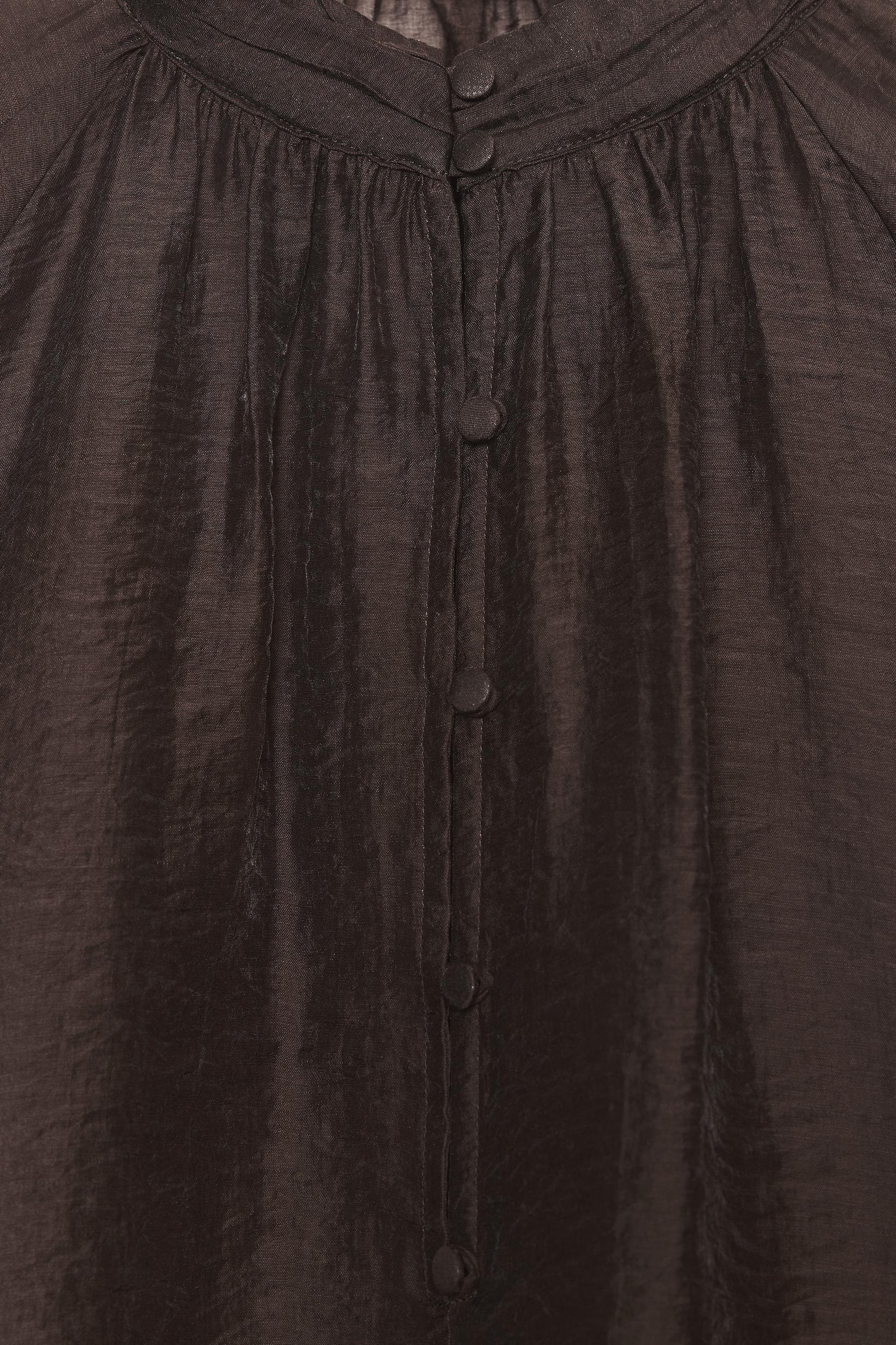 Transparente Bluse mit Puffärmeln