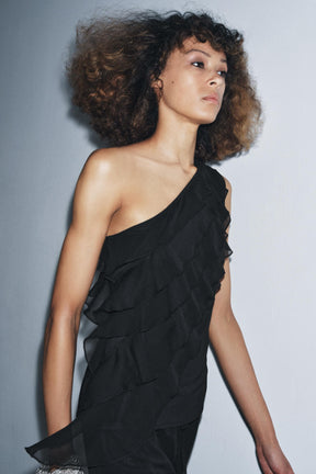 Asymmetrische Rüschenbluse