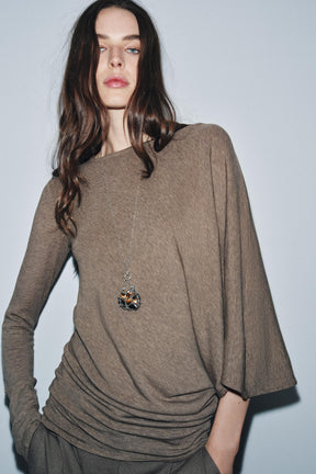 ASYMMETRISCHES CAPE-TOP