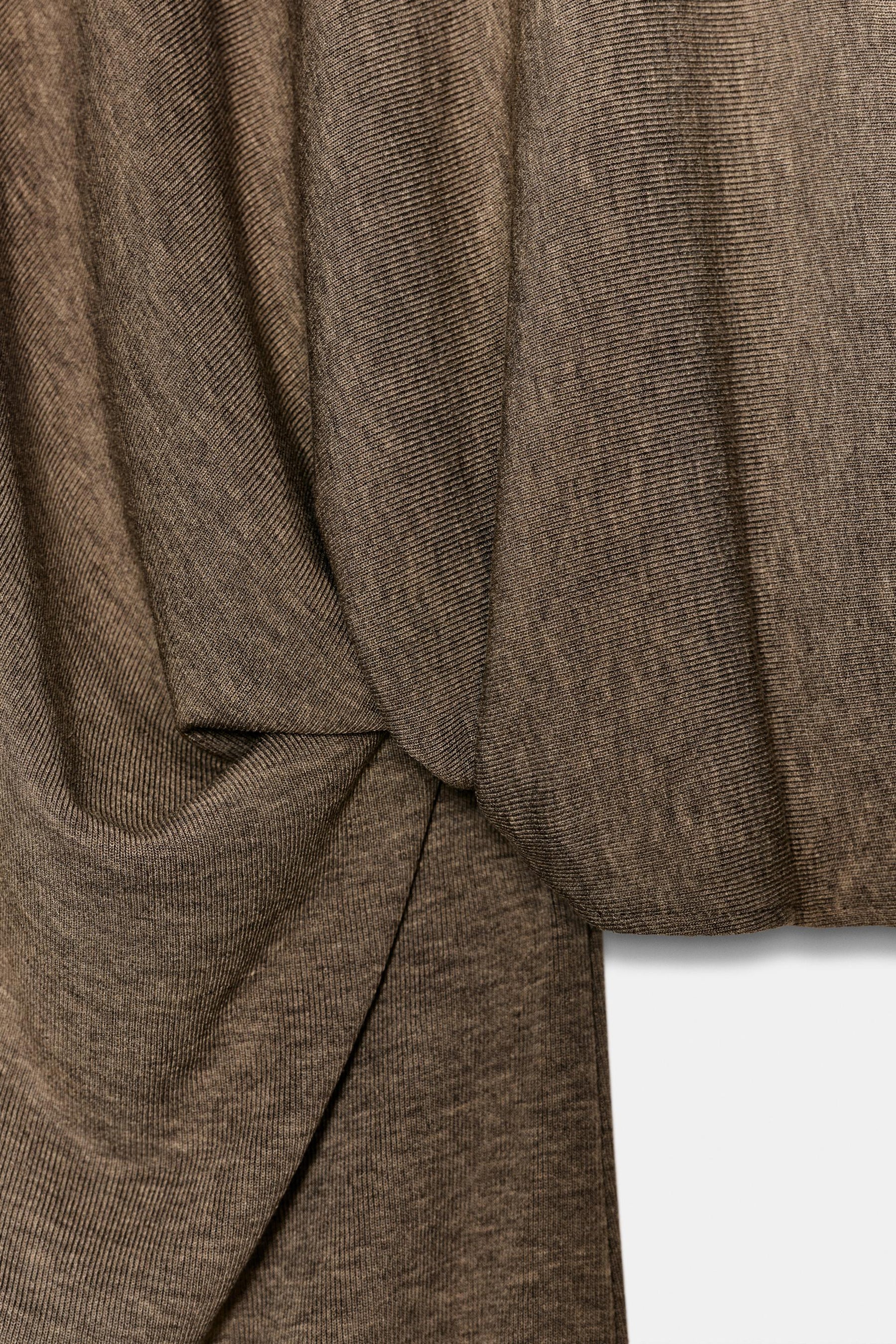 ASYMMETRISCHES CAPE-TOP