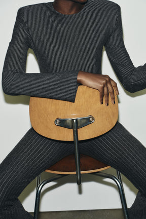 Nadelstreifen-Schlaghosen