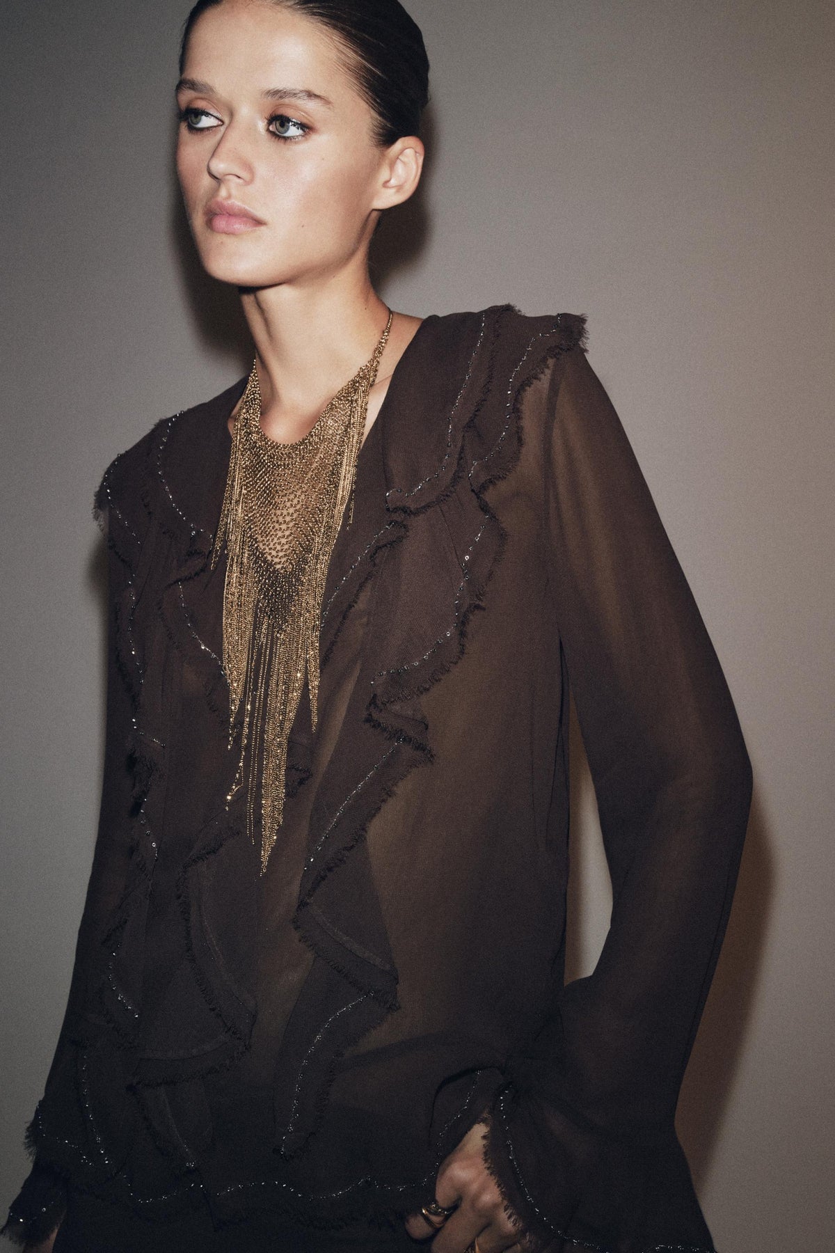 Perlenbesetzte Rüschenbluse