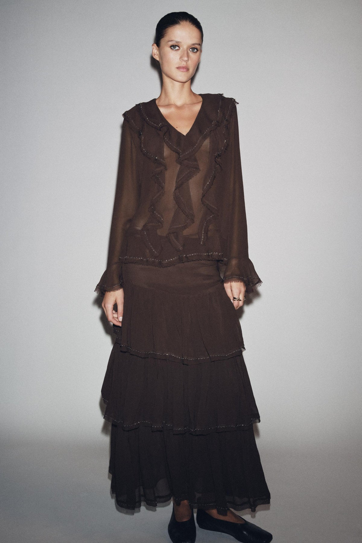 Perlenbesetzte Rüschenbluse